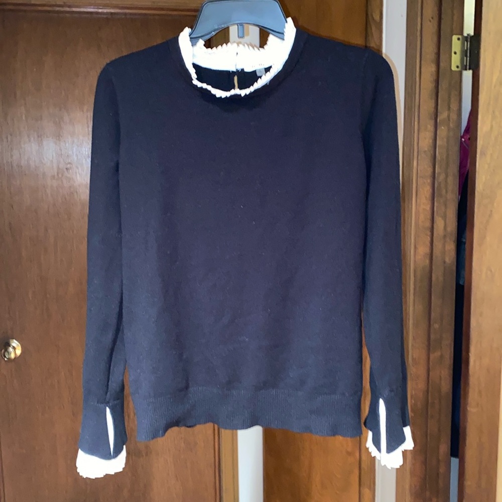 Black ruffled sweater